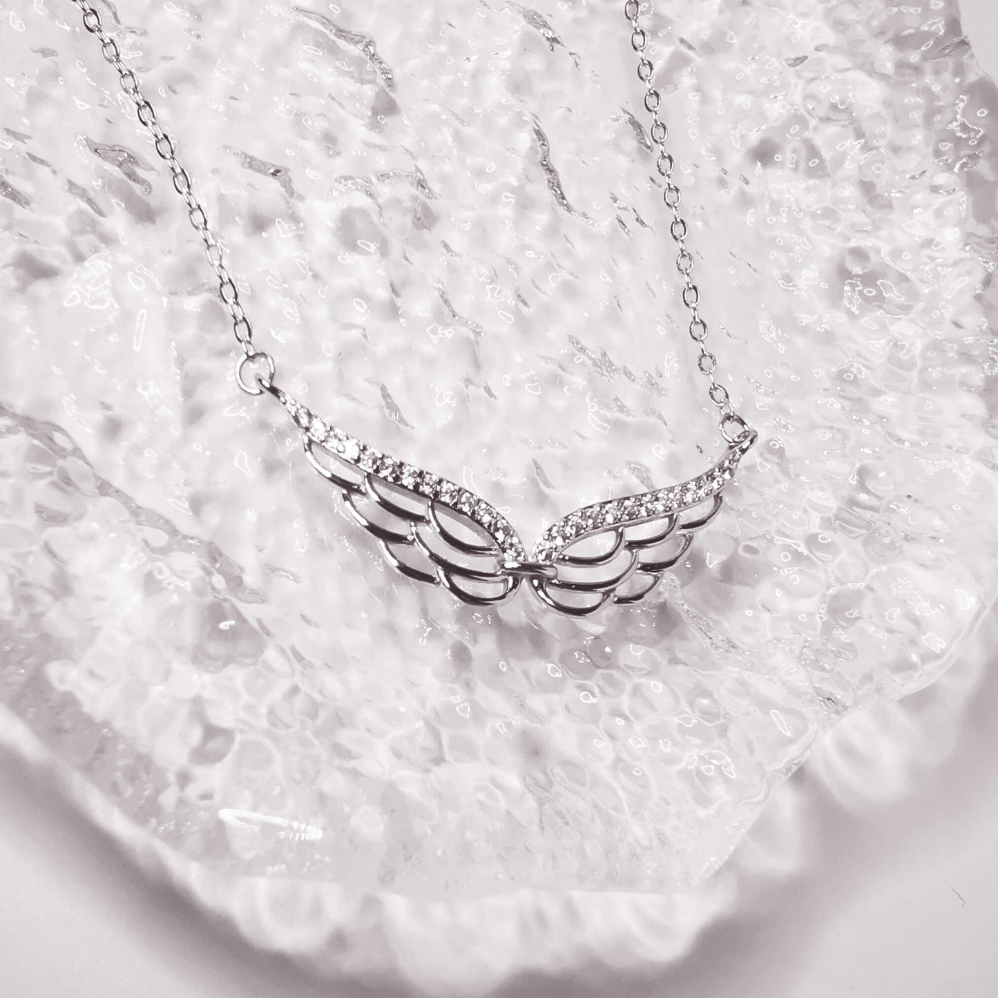 stunning sterling silver double wing necklace with micro zirconia. Detailed angel wing. Perfect unique loss memorial gift.