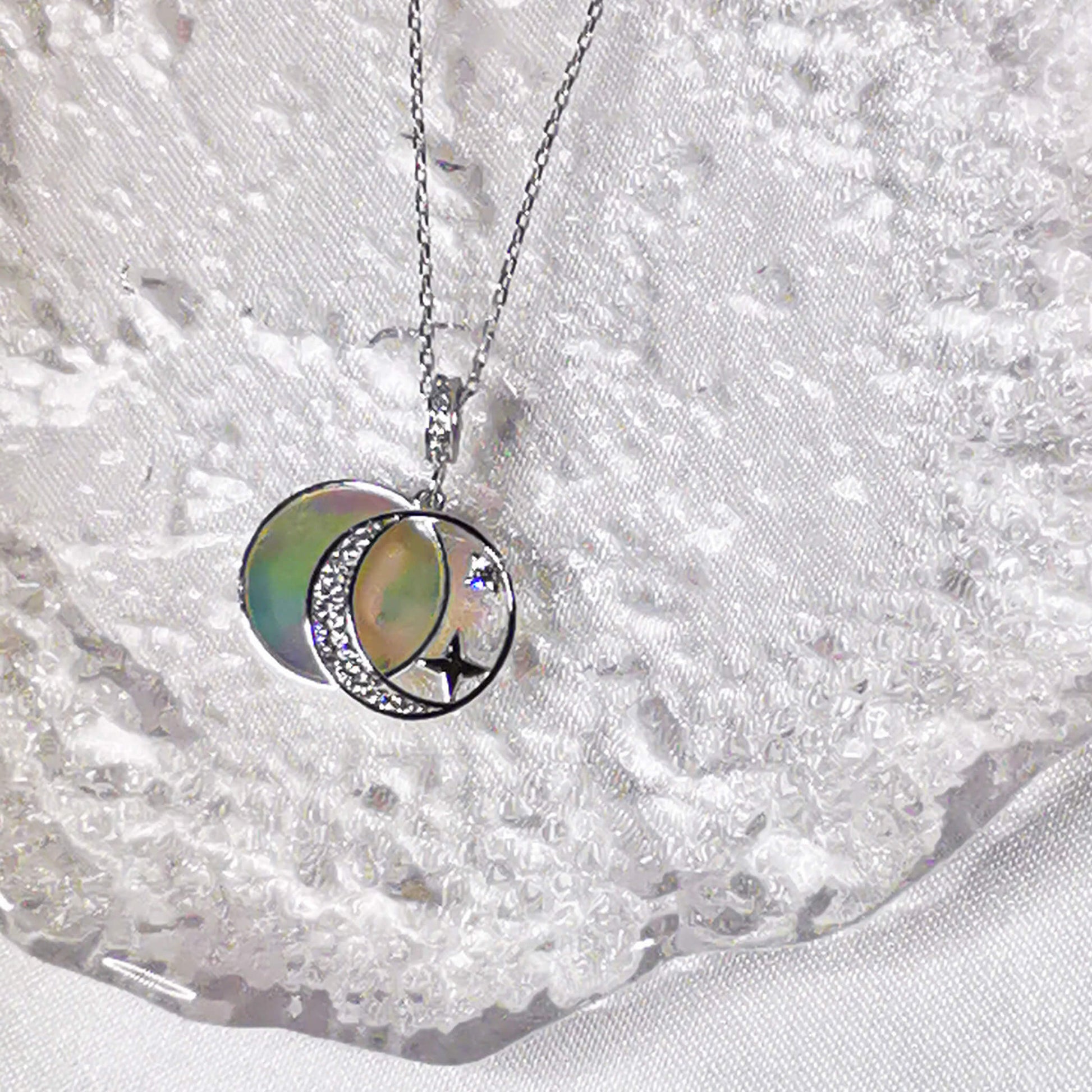925 sterling silver double pendant necklace featuring crescent moon and star on a stunning white shell back.   The perfect unique gift for anniversary, valentines, birthday or Christmas.