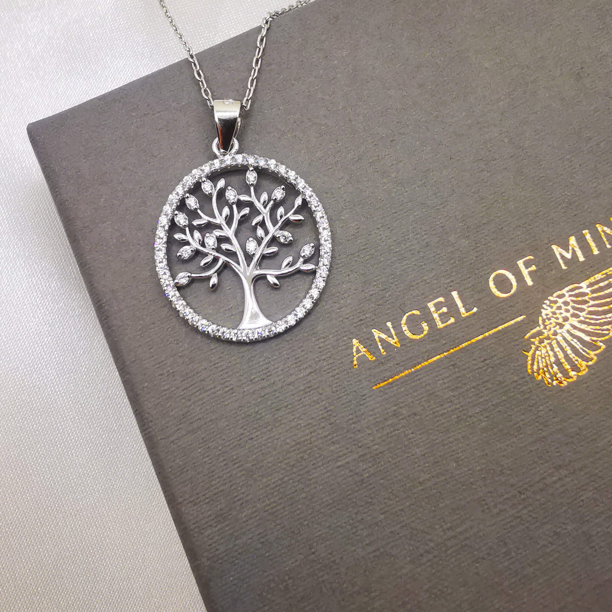 high quality 925 sterling silver tree of life pendant with cubic zirconia. Gift for family.