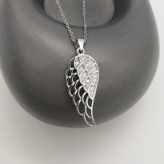 Wings of Grace – Sterling Silver Angel Wing Pendant with Cubic Zirconia